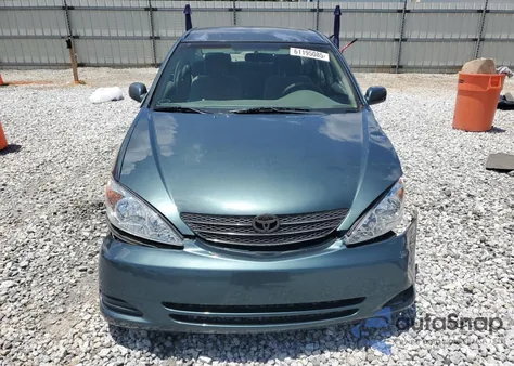2002 Toyota Camry Le z USA, uszkodzony, nr VIN 4T1BF32K02U535439